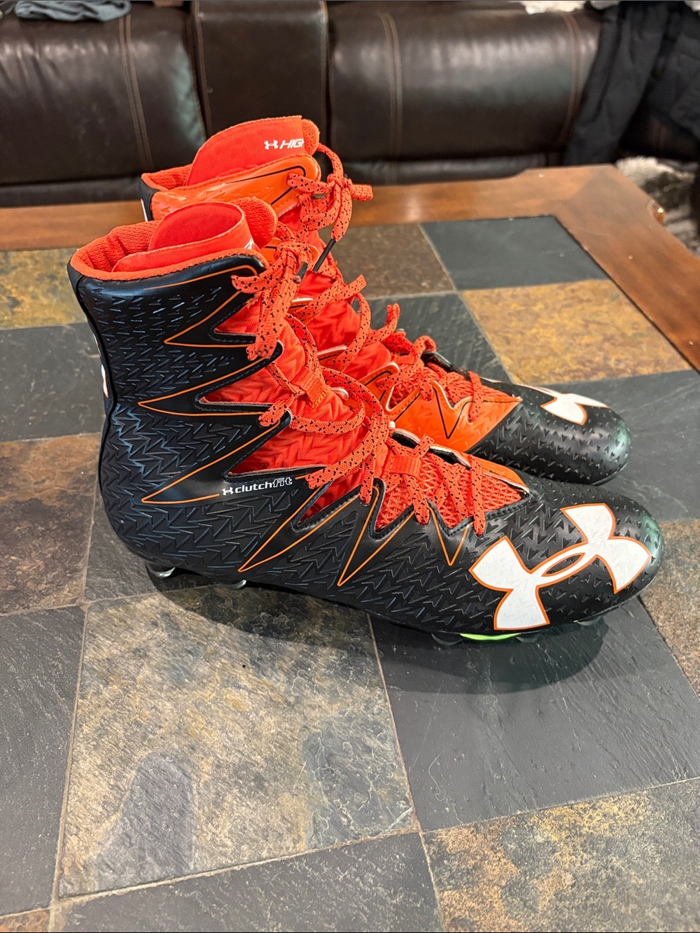 Under Armour Clutchfit Black and Orange High-Top Football Cleats size 12. EUC